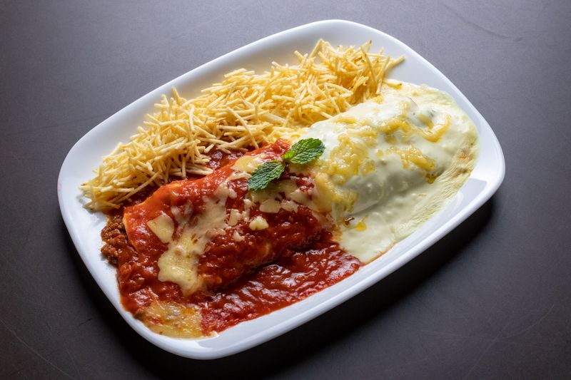 Cafe Rio giant smothered burrito with enchilada sauce